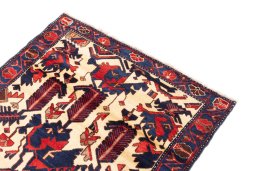Surface texture of 1975s Hamedan rug with natural Wool and intricate pattern