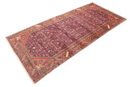 Close-up detail of 1996s Hamedan rug from Iran / Persia showing Wool weave