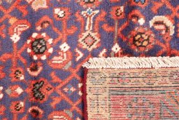 Close-up detail of 1996s Hamedan rug from Iran / Persia showing Wool weave