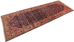 Close-up detail of 1980s Hamedan rug from Iran / Persia showing Wool weave