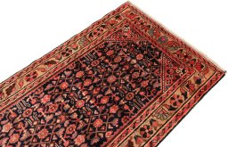 Surface texture of 1980s Hamedan rug with natural Wool and intricate pattern