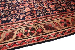 Backside of handmade 1980s Hamedan rug showing knot structure and weave density