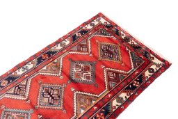 Surface texture of 1985s Hamedan rug with natural Wool and intricate pattern