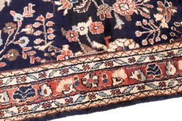 Backside of handmade 2001s Hamedan rug showing knot structure and weave density