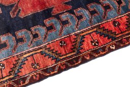 Backside of handmade 1999s Hamedan rug showing knot structure and weave density