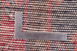 Corner detail of 1990s Hamedan rug showing border pattern and Wool pile