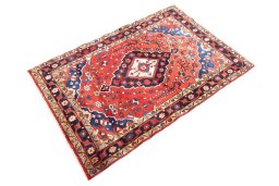 Corner detail of 1970s Hamedan rug showing border pattern and Wool pile