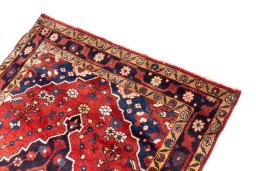 Surface texture of 1970s Hamedan rug with natural Wool and intricate pattern