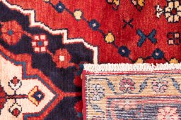 Close-up detail of 1970s Hamedan rug from Iran / Persia showing Wool weave