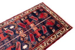 Surface texture of 1970s Hamedan rug with natural Wool and intricate pattern