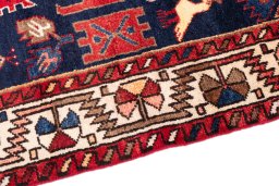 Backside of handmade 1970s Hamedan rug showing knot structure and weave density