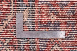 Corner detail of 1986s Hamedan rug showing border pattern and Wool pile