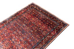 Surface texture of 1986s Hamedan rug with natural Wool and intricate pattern