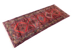 Close-up detail of 1997s Hamedan rug from Iran / Persia showing Wool weave