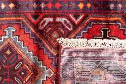 Close-up detail of 1997s Hamedan rug from Iran / Persia showing Wool weave