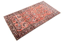 Corner detail of 1970s Hamedan rug showing border pattern and Wool pile