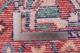 Close-up detail of 1980s Hamedan rug from Iran / Persia showing Wool weave