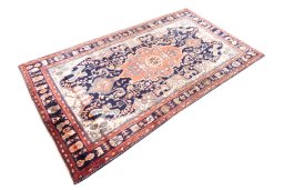 Corner detail of 1980s Hamedan rug showing border pattern and Wool pile