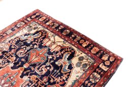 Surface texture of 1980s Hamedan rug with natural Wool and intricate pattern