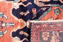 Close-up detail of 1980s Hamedan rug from Iran / Persia showing Wool weave
