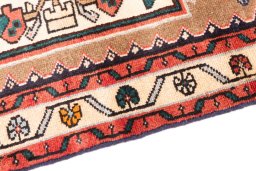Backside of handmade 1970s Hamedan rug showing knot structure and weave density