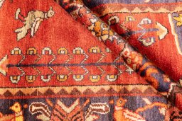 Corner detail of 1995s Hamedan rug showing border pattern and Wool pile