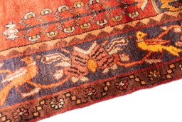 Backside of handmade 1995s Hamedan rug showing knot structure and weave density