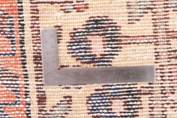 Corner detail of 1973s Hamedan rug showing border pattern and Wool pile