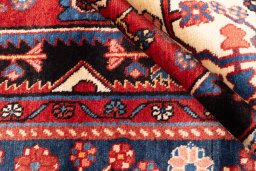 Surface texture of 1997s Hamedan rug with natural Wool and intricate pattern