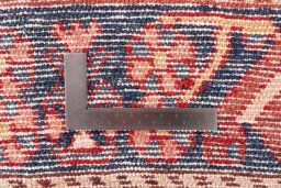 Backside of handmade 1997s Hamedan rug showing knot structure and weave density