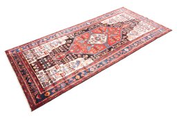 Corner detail of 1997s Hamedan rug showing border pattern and Wool pile