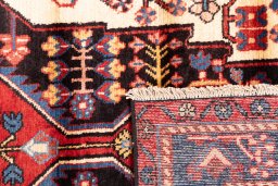 Close-up detail of 1997s Hamedan rug from Iran / Persia showing Wool weave