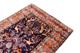 Surface texture of 1998s Hamedan rug with natural Wool and intricate pattern