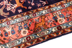 Backside of handmade 1998s Hamedan rug showing knot structure and weave density