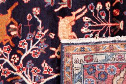 Close-up detail of 1998s Hamedan rug from Iran / Persia showing Wool weave