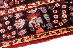 Backside of handmade 1998s Hamedan rug showing knot structure and weave density