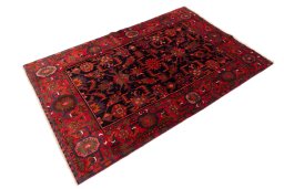 Close-up detail of 1975s Hamedan rug from Iran / Persia showing Wool weave