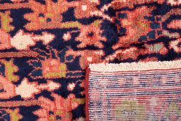 Close-up detail of 1997s Hamedan rug from Iran / Persia showing Wool weave
