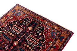 Surface texture of 1975s Hamedan rug with natural Wool and intricate pattern