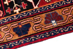 Backside of handmade 1975s Hamedan rug showing knot structure and weave density