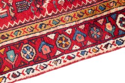 Backside of handmade 1982s Hamedan rug showing knot structure and weave density