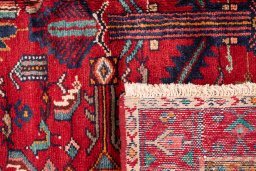Close-up detail of 1982s Hamedan rug from Iran / Persia showing Wool weave