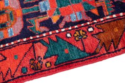 Backside of handmade 1999s Hamedan rug showing knot structure and weave density