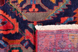 Close-up detail of 1999s Hamedan rug from Iran / Persia showing Wool weave