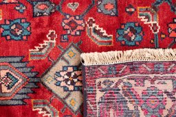 Close-up detail of 1975s Hamedan rug from Iran / Persia showing Wool weave