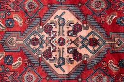 Full view of 1975s Hamedan rug from Iran / Persia, 254 × 140 cm in Red tones