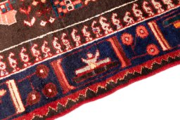 Backside of handmade 1975s Hamedan rug showing knot structure and weave density