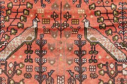 Corner detail of 1976s Hamedan rug showing border pattern and Wool pile