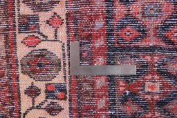 Corner detail of 1990s Hamedan rug showing border pattern and Wool pile
