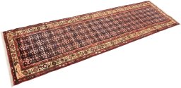 Corner detail of 1990s Hamedan rug showing border pattern and Wool pile